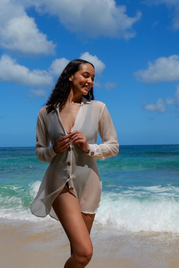 Model wearing MILA white shirt dress as a beach cover-up