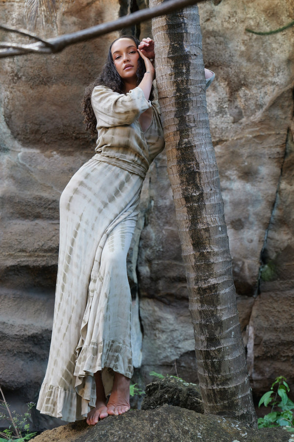 Full-length view of the LOLA khaki wrap dress showing silhouette