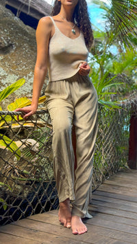 Full-length view of ERI mushroom pants showing wide-leg fit