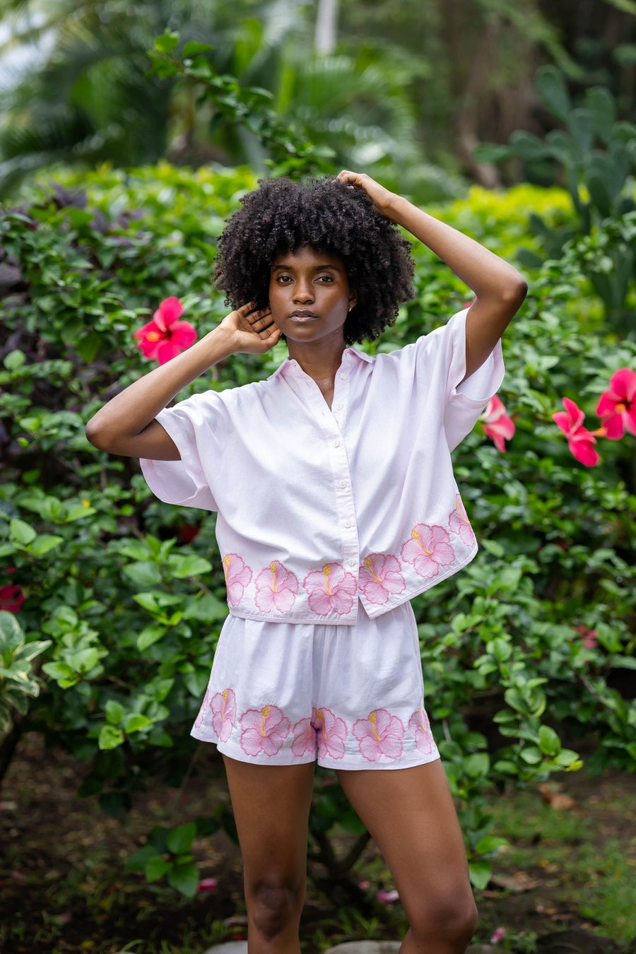 Front view of the matching AURA Shirt and BLISS Short HIBISCUS set in pink
